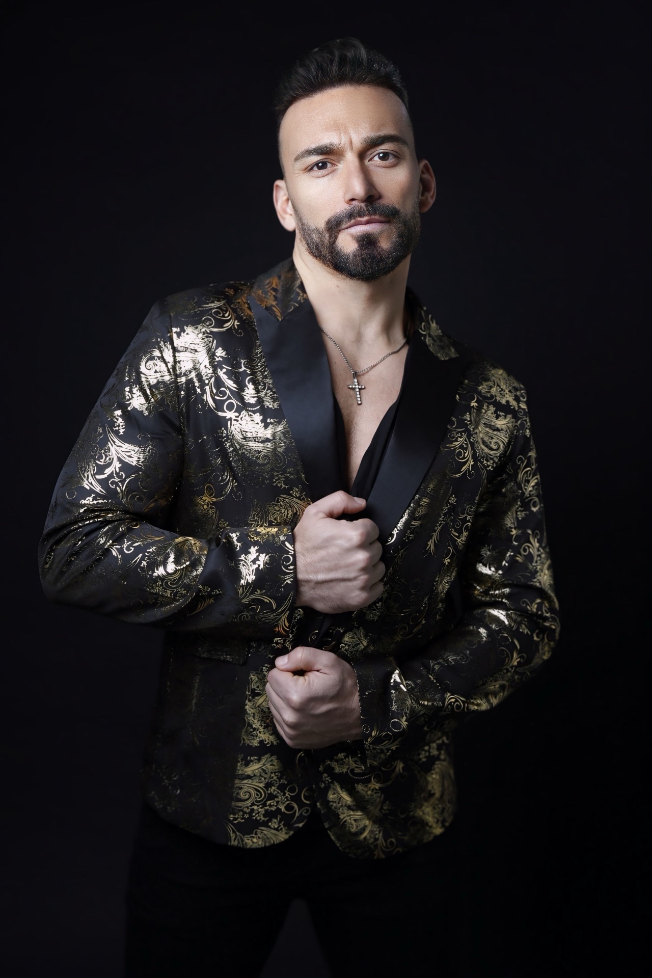 Gianluca Margheri in a black and gold brocade jacket